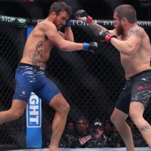 Jim Miller (red gloves) fights Damon Jackson (blue gloves) in the lightweight bout during UFC 309 at Madison Square Garden.