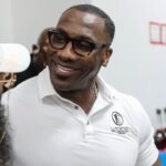 NFL Hall of Famer and former SSU football player Shannon Sharpe talks to a fan from Hinesville, Ga after signing a bottle of his Le Portier Shay VSOP Luxury Cognac at Habersham Beverage Warehouse in Savannah on Thursday, March 19, 2025.