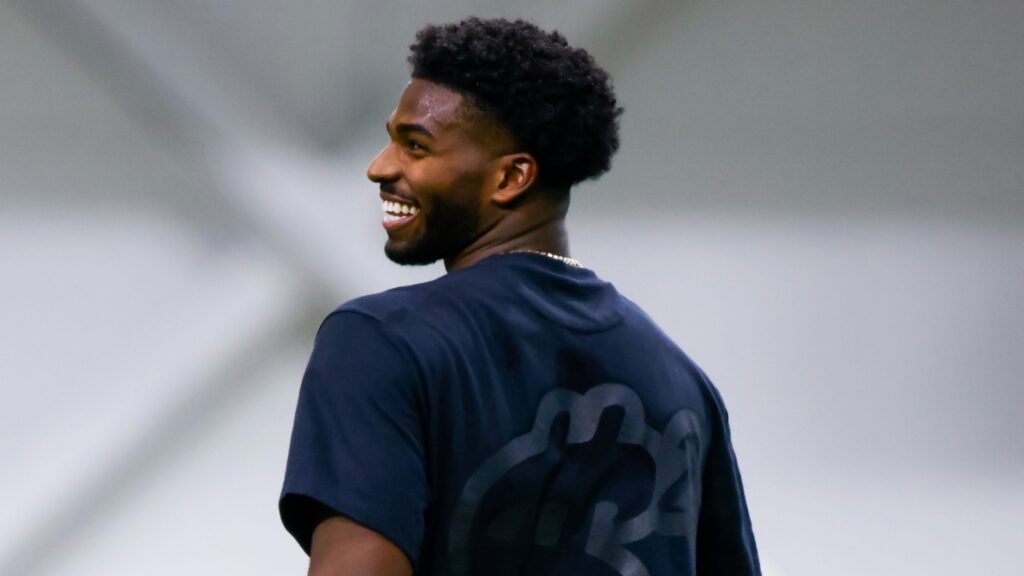 Apr 4, 2025; Boulder, CO, USA; Colorado Buffaloes quarterback Shedeur Sanders (2) laughs during the University of Colorado NFL Showcase at the CU Indoor Practice Facility.