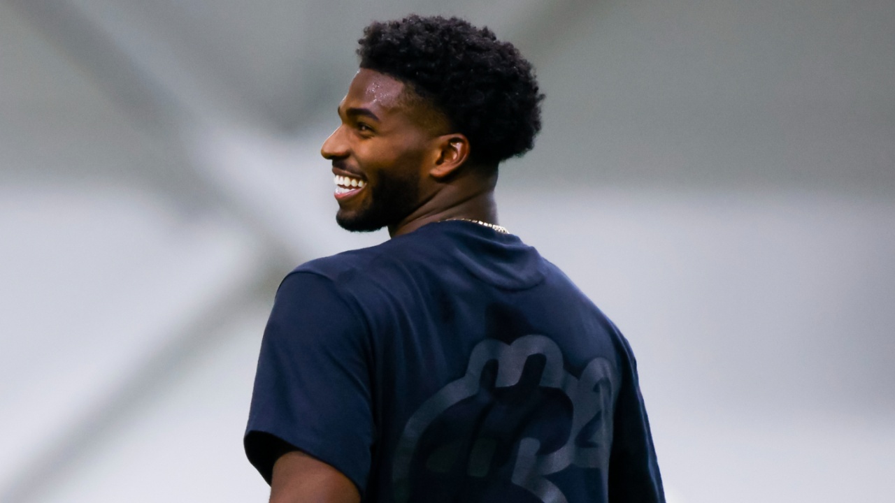 Apr 4, 2025; Boulder, CO, USA; Colorado Buffaloes quarterback Shedeur Sanders (2) laughs during the University of Colorado NFL Showcase at the CU Indoor Practice Facility.