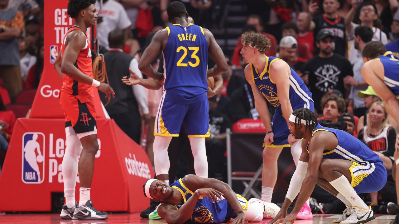 Apr 23, 2025; Houston, Texas, USA; Golden State Warriors forward Jimmy Butler III (10) suffers an apparent injury during the first quarter during game two of the first round for the 2024 NBA Playoffs against the Houston Rockets at Toyota Center.