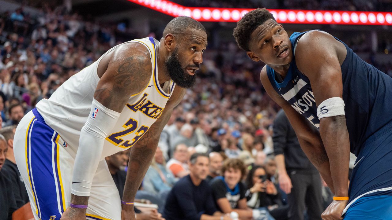 Apr 27, 2025; Minneapolis, Minnesota, USA; Minnesota Timberwolves guard Anthony Edwards (5) guards Los Angeles Lakers forward LeBron James (23) in the second quarter during game four of first round for the 2025 NBA Playoffs at Target Center.