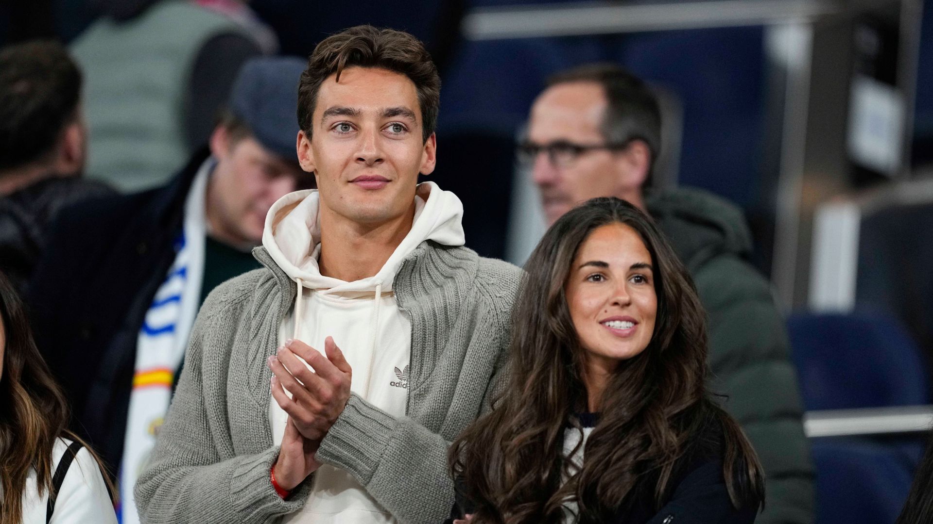Madrid, SPAIN: George Russell, Mercedes F1 driver, and his girlfriend Carmen Montero are seen during the Spanish League