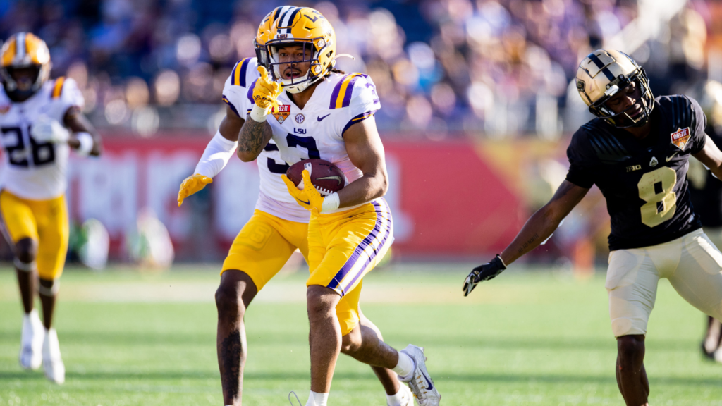 LSU Tigers safety Greg Brooks Jr. (3) gestures after an interception during the second half against the Purdue Boilermakers at Camping World Stadium.