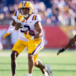LSU Tigers safety Greg Brooks Jr. (3) gestures after an interception during the second half against the Purdue Boilermakers at Camping World Stadium.
