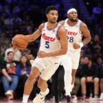 Philadelphia 76ers guard Quentin Grimes (5) controls the ball against the Milwaukee Bucks in the fourth quarter at Wells Fargo Center.