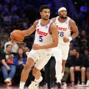 Philadelphia 76ers guard Quentin Grimes (5) controls the ball against the Milwaukee Bucks in the fourth quarter at Wells Fargo Center.