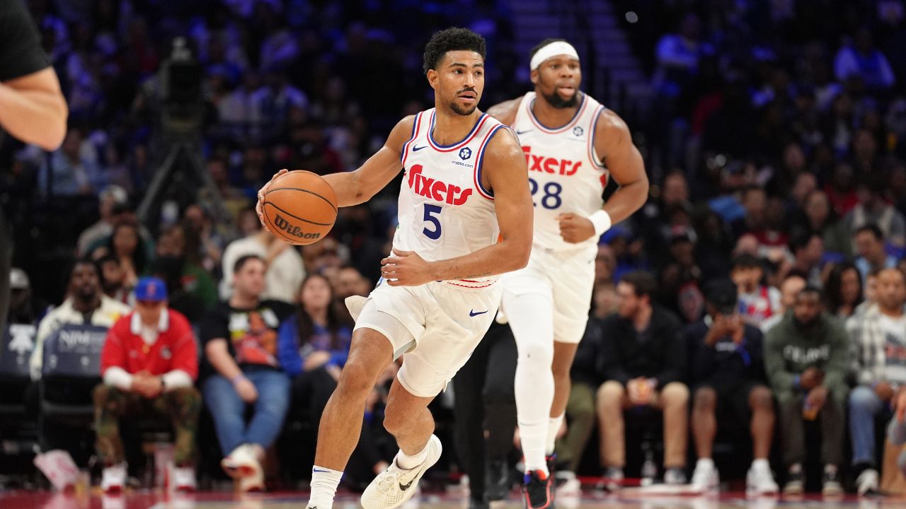 Philadelphia 76ers guard Quentin Grimes (5) controls the ball against the Milwaukee Bucks in the fourth quarter at Wells Fargo Center.