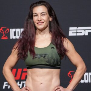 Ketlen Vieira (left) and Miesha Tate (right) face-off in front of Sean Shelby on the scale for the official weigh-in at the UFC Apex for UFC Vegas 43