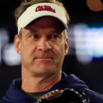 Mississippi Rebels head coach Lane Kiffin is interviewed after the game while holding the Ash Verlander Champions Trophy of the TaxSlayer Gator Bowl Thursday, Jan. 2, 2025 at EverBank Stadium in Jacksonville, Fla. Ole Miss defeated Duke 52-20. [Corey Perrine/Florida Times-Union]