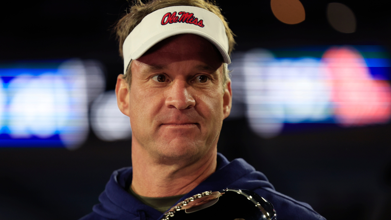 Mississippi Rebels head coach Lane Kiffin is interviewed after the game while holding the Ash Verlander Champions Trophy of the TaxSlayer Gator Bowl Thursday, Jan. 2, 2025 at EverBank Stadium in Jacksonville, Fla. Ole Miss defeated Duke 52-20. [Corey Perrine/Florida Times-Union]