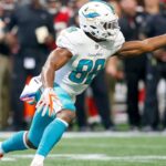 Miami Dolphins wide receiver Leonte Carroo (88) reaches for a ball against the Atlanta Falcons in the third quarter at Mercedes-Benz Stadium.