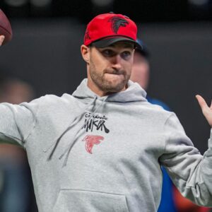Atlanta Falcons quarterback Kirk Cousins (18) warms up on the field prior to the game against the New York Giants at Mercedes-Benz Stadium.