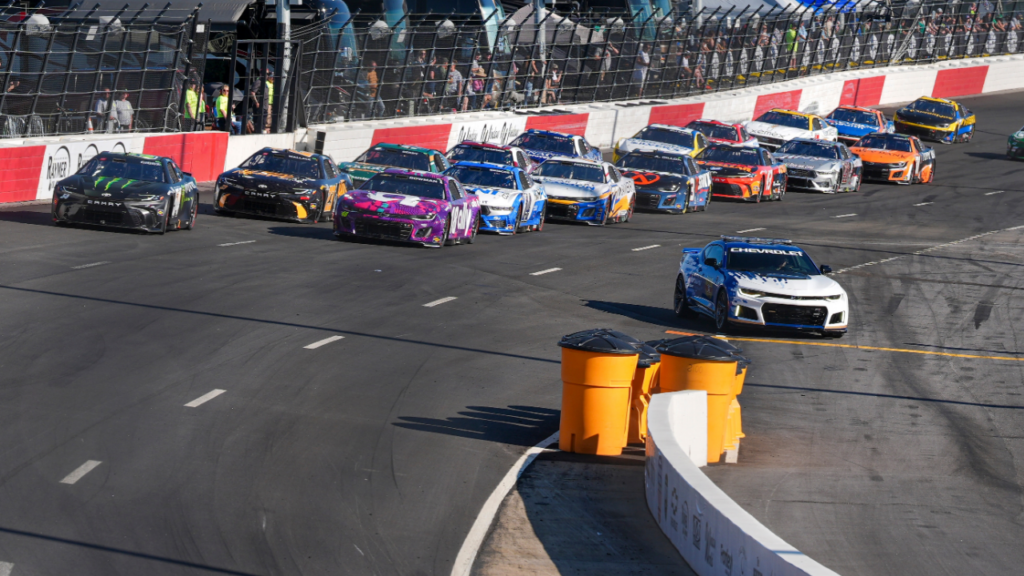 Pace car peels off as the field enters turn three for a restart during the All Star Open race at North Wilkesboro Speedway.