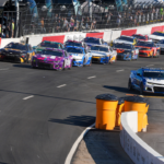 Pace car peels off as the field enters turn three for a restart during the All Star Open race at North Wilkesboro Speedway.