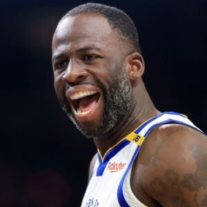 Golden State Warriors forward Draymond Green (23) reacts against the Phoenix Suns during the first half at Footprint Center.