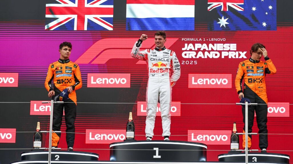Winner Red Bull Racing s Dutch driver Max Verstappen (C) poses with second-placed McLaren s British driver Lando Norris (L) and third-placed McLaren s Australian driver Oscar Piastri on the podium after the Formula One Japanese Grand Prix 2025 at the Suzuka Circuit in Suzuka, Japan, April 6, 2025