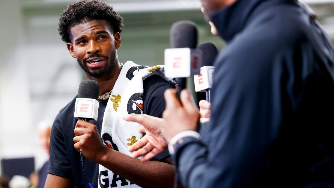 Colorado Buffaloes quarterback Shedeur Sanders (2) talks to ESPN after the University of Colorado NFL Showcase at the CU Indoor Practice Facility.