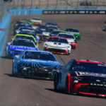 Mar 9, 2025; Avondale, Arizona, USA; NASCAR Cup Series driver Christopher Bell (20) leads driver William Byron (24) and the field for the restart of the Shriners Children’s 500 at Phoenix Raceway. Mandatory Credit: Gary A. Vasquez-Imagn Images