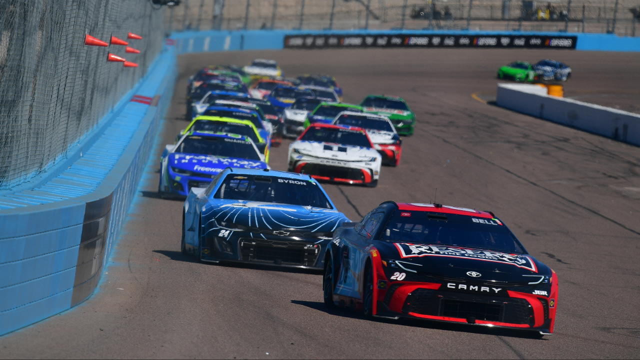 Mar 9, 2025; Avondale, Arizona, USA; NASCAR Cup Series driver Christopher Bell (20) leads driver William Byron (24) and the field for the restart of the Shriners Children’s 500 at Phoenix Raceway. Mandatory Credit: Gary A. Vasquez-Imagn Images