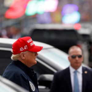 Feb 16, 2025; Daytona Beach, Florida, USA; President Donald Trump arrives in the infield before the Daytona 500 at Daytona International Speedway. Mandatory Credit: Peter Casey-Imagn Images