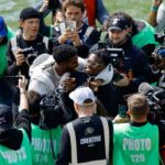 Former Colorado Buffaloes players Shedeur Sanders (L) and Travis Hunter (R) during their number retirement ceremony before the spring game at Folsom Field.