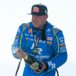 NHRA top fuel driver Tony Stewart celebrates after winning the Four Wide Nationals at The Strip at Las Vegas Motor Speedway. The win is the first of Stewarts professional drag racing career.