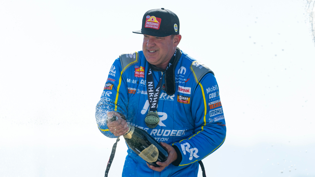 NHRA top fuel driver Tony Stewart celebrates after winning the Four Wide Nationals at The Strip at Las Vegas Motor Speedway. The win is the first of Stewarts professional drag racing career.