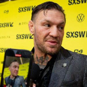 Conor McGregor speaks to press on the red carpet before the premiere of Road House at the Paramount Theatre in Austin, Texas on the first day of South by Southwest, Friday, March 8, 2024. McGregor plays the character \"Knox\" in the movie.