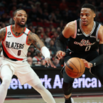 LA Clippers guard Russell Westbrook (0) drives the lane against Portland Trail Blazers guard Damian Lillard