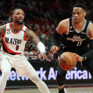 LA Clippers guard Russell Westbrook (0) drives the lane against Portland Trail Blazers guard Damian Lillard