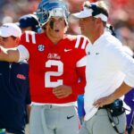 Mississippi Rebels quarterback Jaxson Dart (2) talks with Mississippi Rebels head coach Lane Kiffin during the first half against the Middle Tennessee Blue Raiders at Vaught-Hemingway Stadium.