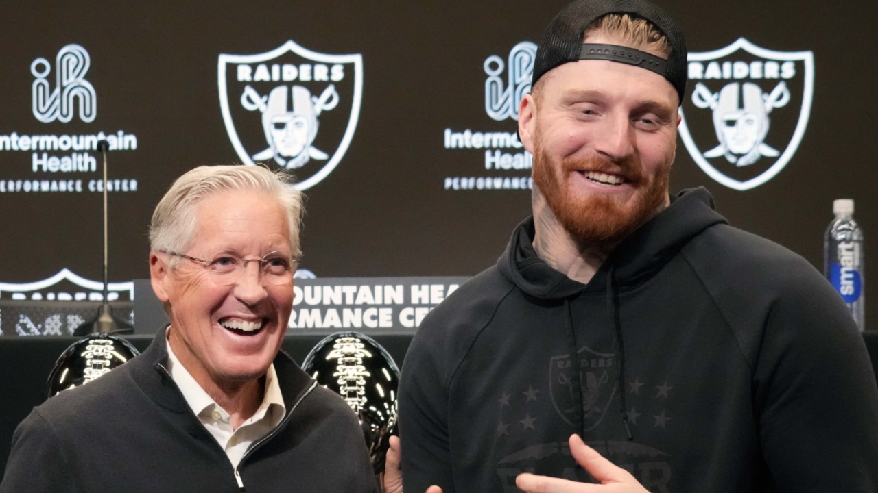 Las Vegas Raiders defensive end Maxx Crosby (right) and coach Pete Carroll at press conference at Intermountain Health Performance Center.