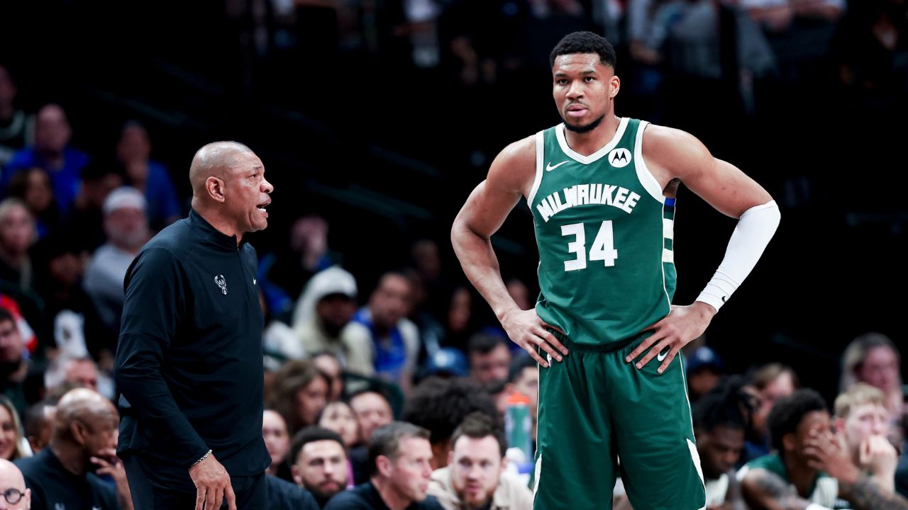 Milwaukee Bucks head coach Doc Rivers speaks to Milwaukee Bucks forward Giannis Antetokounmpo (34) during the second half against the Dallas Mavericks at American Airlines Center.