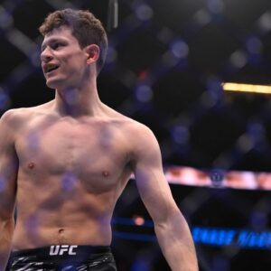 CHASE HOOPER (14-3-1) of Enumclaw, WA finish CLAY GUIDA (38-21-0) of Round Lake, IL via (arm bar) in round 1 during the UFC 310 event at the T Mobile Arena, Las Vegas Las Vegas USA