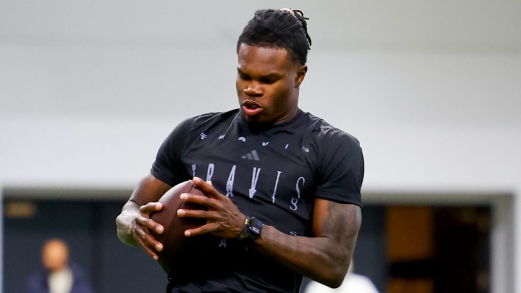 Apr 4, 2025; Boulder, CO, USA; Colorado Buffaloes wide receiver Travis Hunter (12) catches a pass at the University of Colorado NFL Showcase at the CU Indoor Practice Facility.