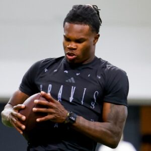 Apr 4, 2025; Boulder, CO, USA; Colorado Buffaloes wide receiver Travis Hunter (12) catches a pass at the University of Colorado NFL Showcase at the CU Indoor Practice Facility.