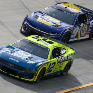 Mar 16, 2024; Bristol, Tennessee, USA; NASCAR Cup Series driver Ryan Blaney (12) leads driver Chase Elliott (9) during the Food City 500 at Bristol Motor Speedway. Mandatory Credit: Randy Sartin-Imagn Images