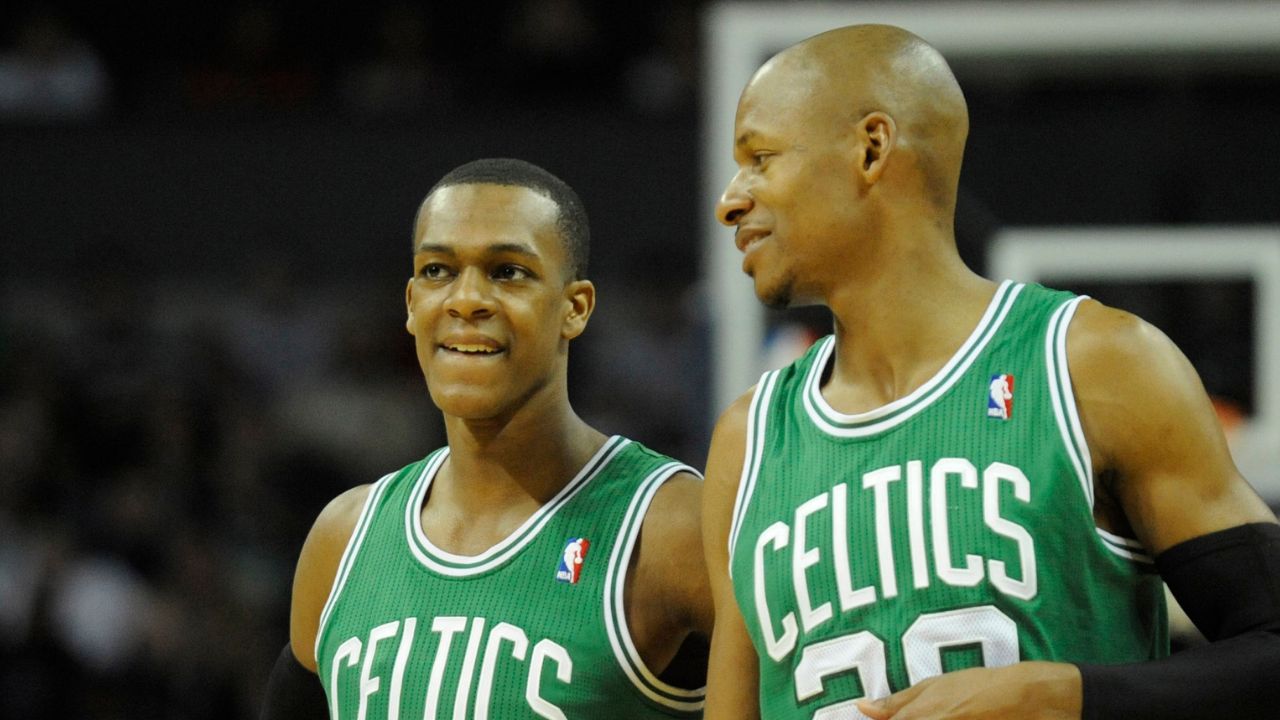 Boston Celtics guard Rajon Rondo (left) and guard Ray Allen (right) talk against the Charlotte Bobcats at Time Warner Cable Arena.