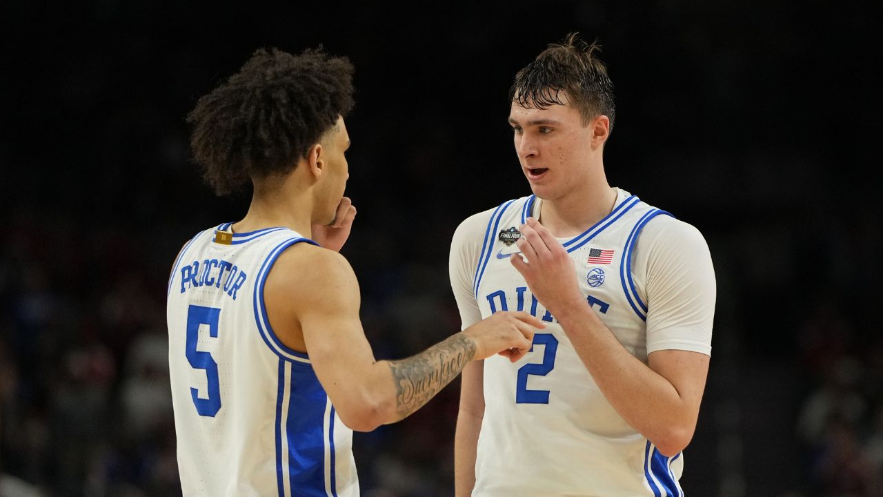 Duke Blue Devils forward Cooper Flagg (2) talks with guard Tyrese Proctor (5) after a play against the Houston Cougars during the second half in the semifinals of the men's Final Four of the 2025 NCAA Tournament at the Alamodome