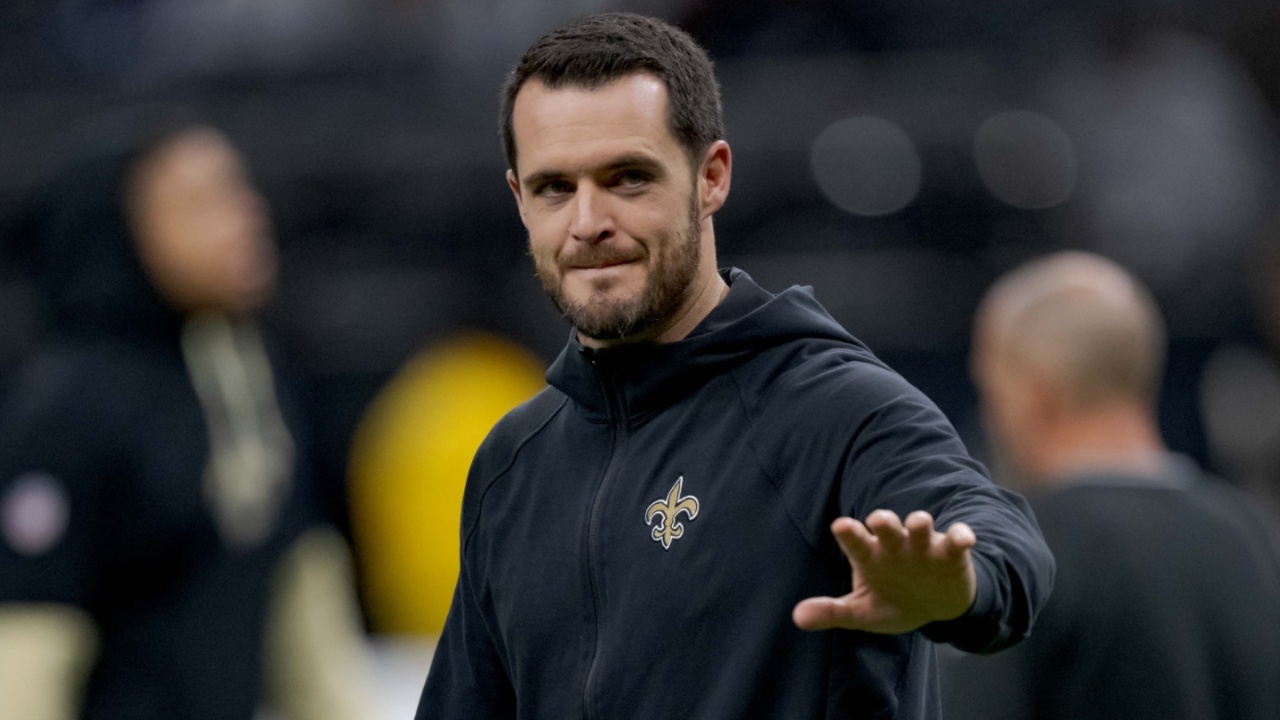 New Orleans Saints quarterback Derek Carr (4) walks the field before a game against the Las Vegas Raiders at Caesars Superdome.