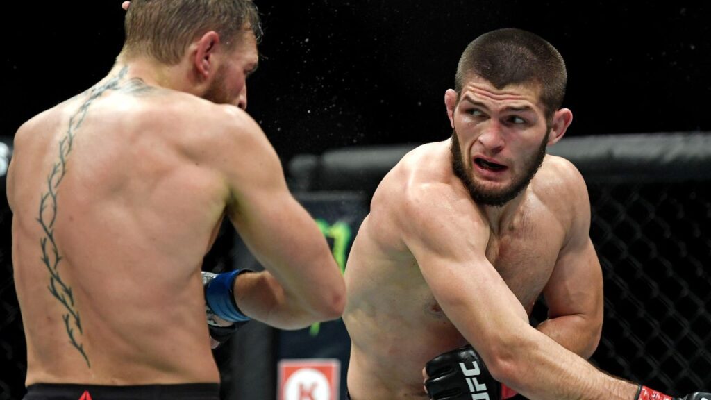 Khabib Nurmagomedov (red gloves) fights Conor McGregor (blue gloves) during UFC 229 at T-Mobile Arena.