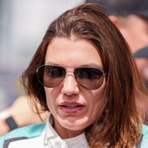 Katherine Legge (32) speaks with fans before the race at Talladega Superspeedway.