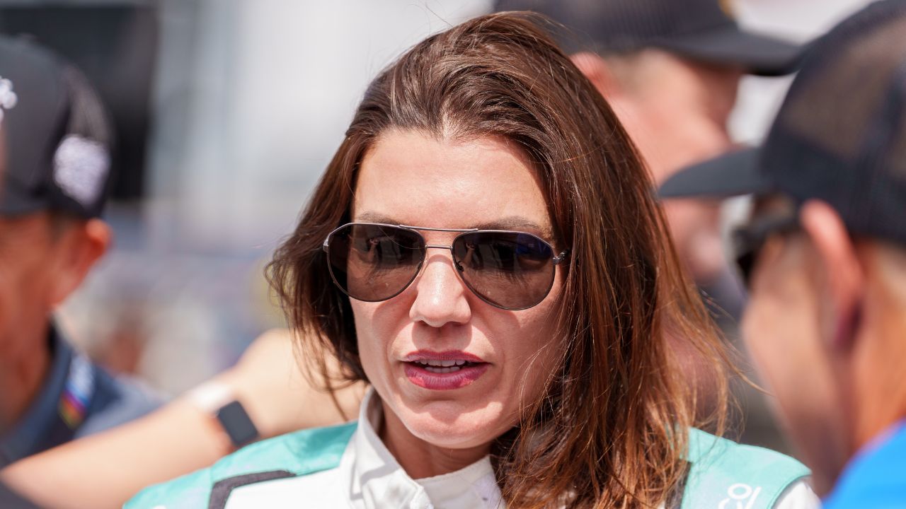 Katherine Legge (32) speaks with fans before the race at Talladega Superspeedway.