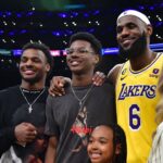 Los Angeles Lakers forward LeBron James (6) poses for photos with his sons Bronny and Bryce Maximus, daughter Zhuri, wife Savannah and mother Gloria after the game against the Oklahoma City Thunder at Crypto.com Arena.