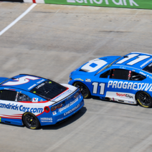 NASCAR Cup Series driver Kyle Larson (5) leads driver Denny Hamlin (11) during the NASCAR Food City 500 at Bristol Motor Speedway.