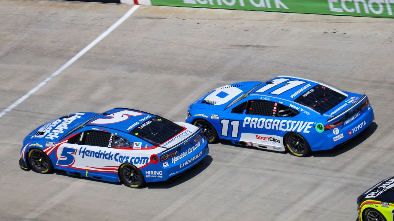 NASCAR Cup Series driver Kyle Larson (5) leads driver Denny Hamlin (11) during the NASCAR Food City 500 at Bristol Motor Speedway.