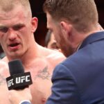 Ian Machado Garry (red gloves) reacts after defeating Carlos Prates (not pictured) during UFC Fight Night at T-Mobile Center.