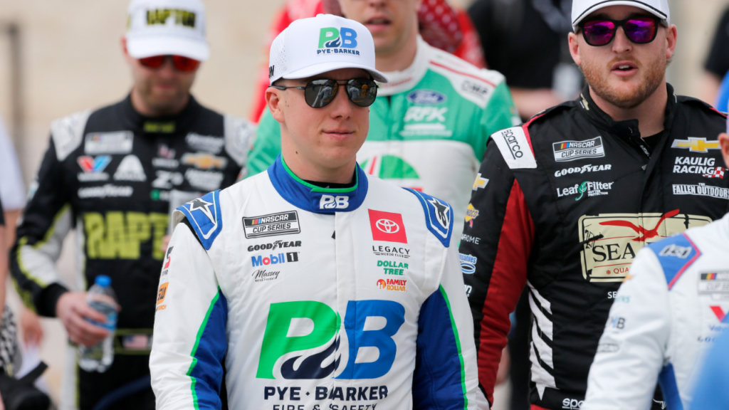 Mar 2, 2025; Austin, Texas, USA; NASCAR Cup Series driver John Hunter Nemechek (42) walks into EchoPark Automotive Grand Prix for driver introductions at Circuit of the Americas. Mandatory Credit: Jamie Harms-Imagn Images