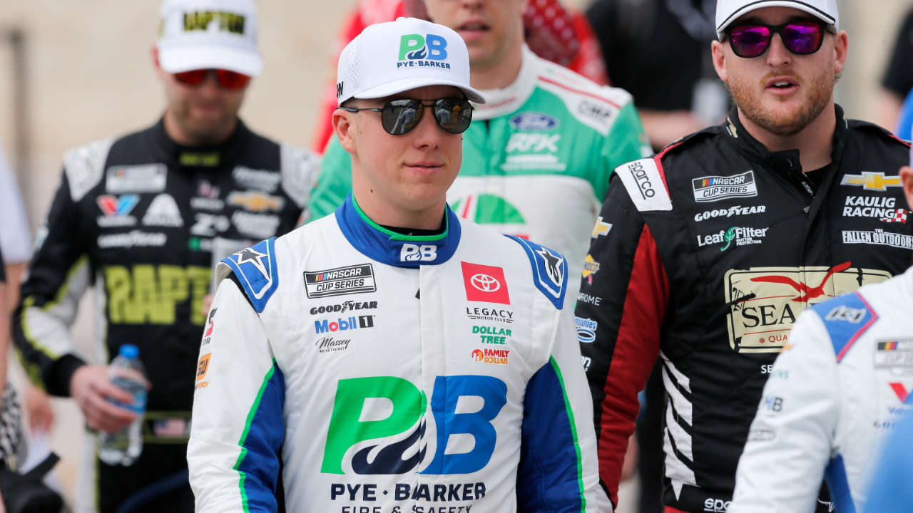 Mar 2, 2025; Austin, Texas, USA; NASCAR Cup Series driver John Hunter Nemechek (42) walks into EchoPark Automotive Grand Prix for driver introductions at Circuit of the Americas. Mandatory Credit: Jamie Harms-Imagn Images